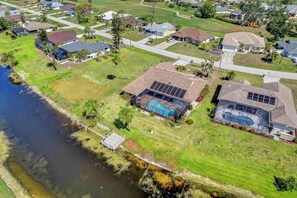 Exterior - Canal-front home with sandy beaches, golf courses, dock, & refreshing pool (Rotonda West)