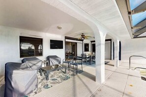 Outdoor dining - Snowbird Friendly Waterfront Escape with Private Pool, Dock & Serene Canal Views (Port Charlotte)