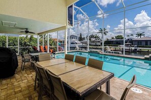 Outdoor dining - Spacious dog-friendly home with private pool/hot tub, dock & close to everything (Marco Island)