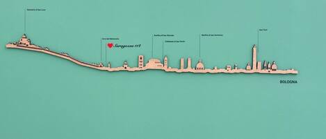 A stylized map of Bologna with landmarks like the Basilica di San Petronio and the Arco del Meloncello.