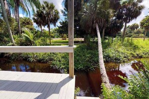 Property grounds - Riverfront dog-friendly cottages with kayaks, dock, patio, grill, & water views (Bonita Springs)