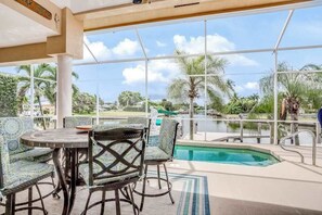 Dining - Modern, canal-front home with amazing views, private pool, central AC, fast WiFi (Marco Island)