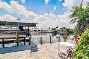 Terrace/patio - Dog-friendly waterfront home with heated pool, lanai, central AC, & W/D (Matlacha Isles)