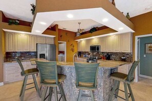 Fridge, microwave, oven, stovetop - Dog-friendly waterfront home with heated pool, lanai, central AC, & W/D (Matlacha Isles)