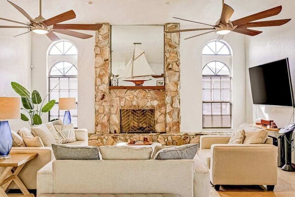 TV, fireplace, offices - Waterfront Escape with Heated Pool, Stunning Sunsets & Coastal Charm (Port Charlotte)