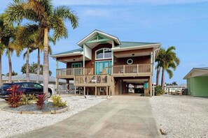 Exterior - Canal front home with in ground pool, wifi, private dock & water access (Saint James City)