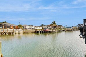 Marina - Canal front home with in ground pool, wifi, private dock & water access (Saint James City)