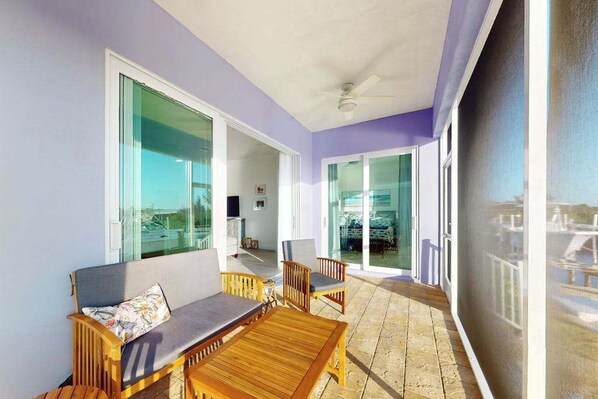 Terrace/patio - Dog-friendly, canal-front getaway with a dock, screened lanai, & washer/dryer (Saint James City)