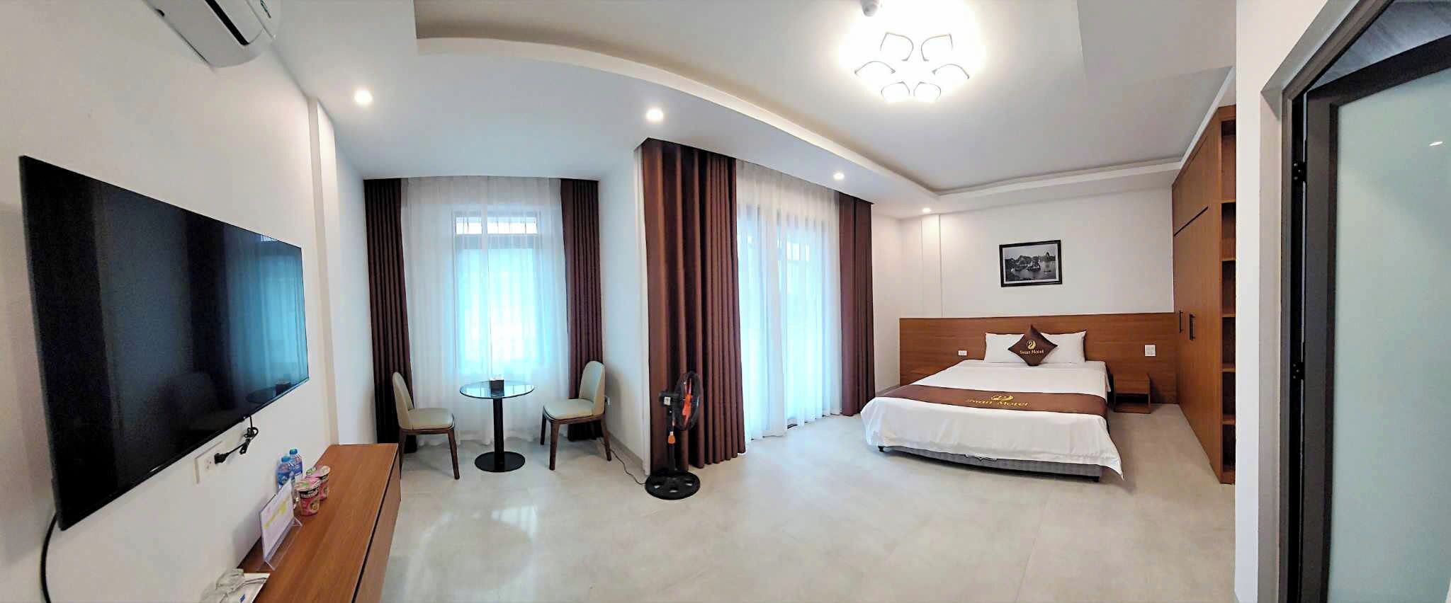 Deluxe Double Room, Balcony, City View | Desk, laptop workspace, blackout drapes, soundproofing