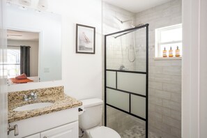 Shower, hair dryer, towels, soap