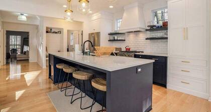 Modern Lake Michigan home with wood fireplace, open layout, deck, W/D, & AC