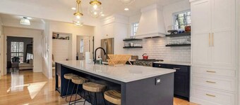 Modern Lake Michigan home with wood fireplace, open layout, deck, W/D, & AC