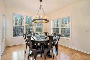 Dining - Modern Lake Michigan home with wood fireplace, open layout, deck, W/D, & AC (Fennville)