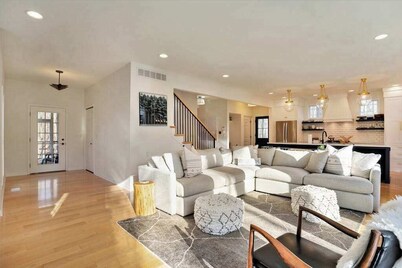 Modern Lake Michigan home with wood fireplace, open layout, deck, W/D, & AC