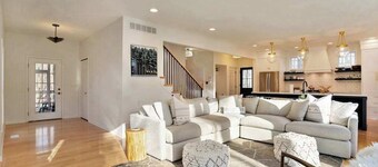 Modern Lake Michigan home with wood fireplace, open layout, deck, W/D, & AC