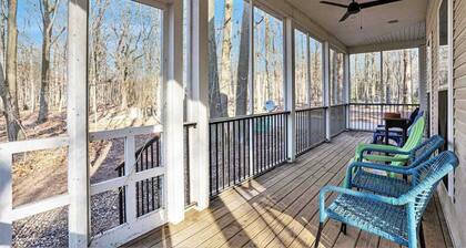 Modern Lake Michigan home with wood fireplace, open layout, deck, W/D, & AC