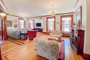 TV, fireplace, offices - Historical dog-friendly home with fenced yard, grill, Ping-Pong, fireplace, & AC (Manistee)