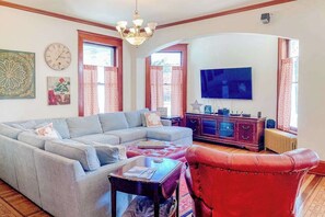 TV, fireplace, offices - Historical dog-friendly home with fenced yard, grill, Ping-Pong, fireplace, & AC (Manistee)