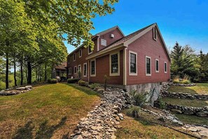 Exterior - Exquisite Cape Cod home with large yard, fireplace, central AC, & W/D (Maple City)