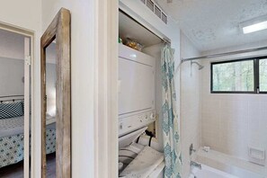 Shower, hair dryer, towels - Single-level lakefront hideaway with a deck, fireplace, & washer/dryer (Glen Arbor)