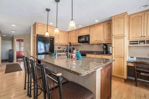 Fridge, microwave, oven, stovetop - Lakefront condo with deck, gorgeous view, fireplace, & W/D (Glen Arbor)