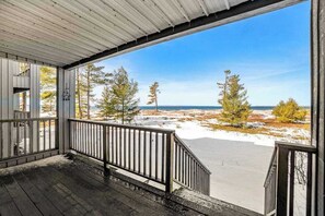 Property grounds - Lakefront condo with deck, gorgeous view, fireplace, & W/D (Glen Arbor)