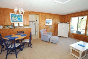 Dining - Lakefront cottage with a deck, grill, firepit, dock & partial AC (Glen Arbor)