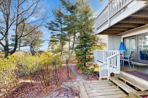 Terrace/patio - Desirable beachfront condo in Glen Arbor with patio, fireplace, kitchenette & AC (Glen Arbor)