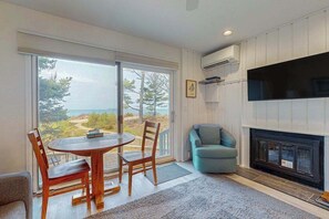 TV, fireplace - Desirable beachfront condo in Glen Arbor with patio, fireplace, kitchenette & AC (Glen Arbor)