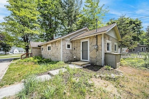 Exterior - Stone home two blocks from the lake & downtown with gas grill & free WiFi (Boyne City)