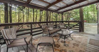 Riverfront cabin on the Betsie with private dock, kayaks & bikes - 2 dogs OK