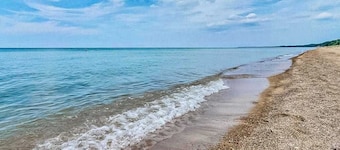 Lake Michigan Retreat w/ stunning views, hot tub, & large patio!