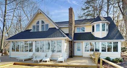 Spacious lakefront home with panoramic views and private beach