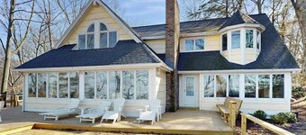 Spacious lakefront home with panoramic views and private beach