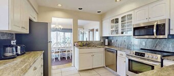 Spacious lakefront home with panoramic views and private beach