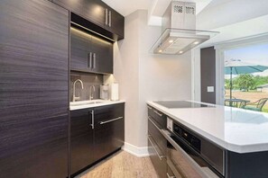 Fridge, microwave, oven, stovetop - Updated condo with well-equipped kitchen, pool, firepits, grill, & gas fireplace (Douglas)