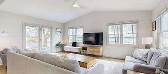 Tranquil Lakeview Retreat in Suttons Bay, with a private sauna, & large yard
