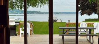 Remodeled, waterfront home on Portage Lake with dock & firepit - 2 dogs OK