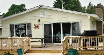 Remodeled, waterfront home on Portage Lake with dock & firepit - 2 dogs OK
