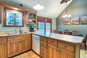 Fridge, microwave, oven, stovetop - Dog-friendly secluded home near Suttons Bay with water views, firepit, fireplace (Suttons Bay)