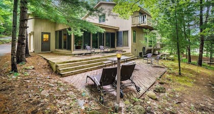 Two-story home with a patio, sunroom, balcony, & washer/dryer access