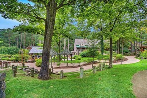 Property grounds - Two-story home with a patio, sunroom, balcony, & washer/dryer access (Glen Arbor)