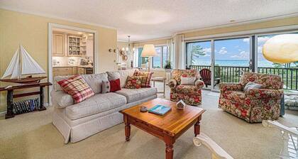 Lake-view condo with private beach, fireplace, deck, washer/dryer, streaming
