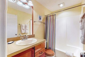 Shower, towels - Riverfront condo with lake and river access, fireplace, firepit & gym (Glen Arbor)