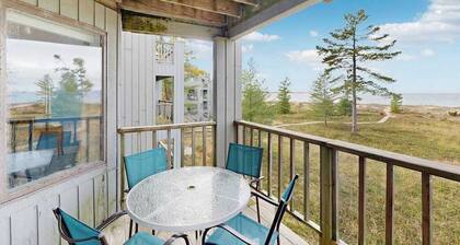 Cheery beachfront condo in Glen Arbor's Homestead Resort with deck & fireplace