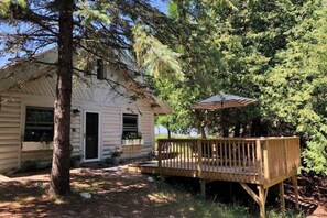 Terrace/patio - Lakefront cabin with 100 ft of Lake Michigan beach, full kitchen, loft, & deck (Empire)
