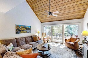 TV, DVD player, offices - Riverfront condo with lake access, views, deck, washer/dryer, community firepit (Glen Arbor)