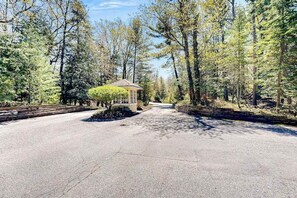 Property grounds - Riverfront condo with lake access, views, deck, washer/dryer, community firepit (Glen Arbor)