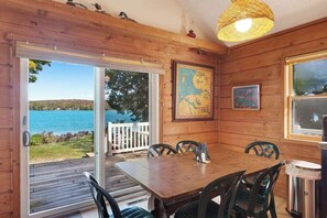 Dining - Cottage with lake views, private dock & firepit - near public boat launch (Boyne City)