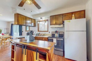 Fridge, microwave, oven, stovetop - Water front home on canal with large patio, space for boat, & gas grill (Indian River)